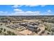 Overhead view of campus featuring landscaping, buildings, and parking lot at 23951 E Easter Pl, Aurora, CO 80016