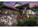 Charming entryway with wood stairs, stone accents, and lush landscaping detail at 23951 E Easter Pl, Aurora, CO 80016