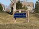 Golden Eagle Park sign with tree and house in background at 23951 E Easter Pl, Aurora, CO 80016