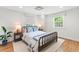 Cozy bedroom featuring a bed and end tables at 5061 S Florence Dr, Englewood, CO 80111
