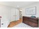 Bedroom with a changing table and closet at 5061 S Florence Dr, Englewood, CO 80111