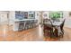 Kitchen bar and dining nook create an easy flow, excellent for gatherings at 5061 S Florence Dr, Englewood, CO 80111