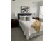 Cozy bedroom with carpet, a queen bed, and two side tables with lamps at 348 N. Geneva St, Aurora, CO 80010