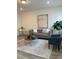 Bright living room design with modern furniture and light wood floors at 348 N. Geneva St, Aurora, CO 80010