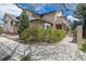 Well maintained home exterior and landscaped yard shows pride of ownership in a quiet neighborhood at 8757 E Dry Creek Rd # 1512, Englewood, CO 80112