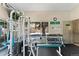 Well-equipped fitness center with various machines and weights for residents' exercise needs at 8757 E Dry Creek Rd # 1512, Englewood, CO 80112