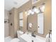 Stylish bathroom with a glass-enclosed shower, modern vanity, and updated fixtures, for a spa-like experience at 921 S Walden Street # 205, Aurora, CO 80017
