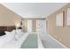Bright bedroom with plush carpet and ensuite bath for a calm and relaxing living space at 921 S Walden Street # 205, Aurora, CO 80017