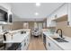 Well-designed kitchen area that seamlessly connects to the dining room, creating an inviting atmosphere at 921 S Walden Street # 205, Aurora, CO 80017
