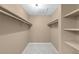 Spacious walk-in closet with ample shelving and storage, providing organization and convenience at 921 S Walden Street # 205, Aurora, CO 80017