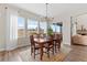 Charming dining room with hardwood floors and large windows at 3093 Belay Pt, Castle Rock, CO 80108