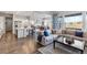 Open concept kitchen with island and stainless steel appliances at 3093 Belay Pt, Castle Rock, CO 80108
