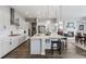 Bright kitchen with an expansive island and stainless steel appliances at 3093 Belay Pt, Castle Rock, CO 80108