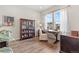 Home office with built-in shelving and large windows at 3093 Belay Pt, Castle Rock, CO 80108