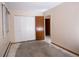 Bedroom with closet, neutral paint, window, and base trim at 660 S Alton Way # 12C, Denver, CO 80247