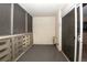 Outdoor patio featuring screening and a door to the exterior at 660 S Alton Way # 12C, Denver, CO 80247