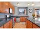 Well-lit kitchen with granite countertops, stainless steel appliances, and stylish cabinets at 4100 Albion St # 307, Denver, CO 80216