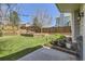 Beautifully landscaped backyard with stepped terrace and gazebo at 9916 Spring Hill Ln, Highlands Ranch, CO 80129