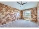 Bedroom with vaulted ceiling, carpet, and a decorative accent wall at 9916 Spring Hill Ln, Highlands Ranch, CO 80129
