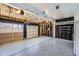 Spacious two-car garage with epoxy flooring at 9916 Spring Hill Ln, Highlands Ranch, CO 80129