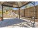 Gazebo with brick floors and a view of tiered garden beds at 9916 Spring Hill Ln, Highlands Ranch, CO 80129
