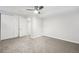 Basement bedroom with double doors and grey carpet at 1155 Garfield St, Denver, CO 80206