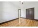 Spacious bedroom with hardwood floors and built-in closet at 1155 Garfield St, Denver, CO 80206