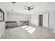 Bright bedroom with laminate floors and a ceiling fan at 1155 Garfield St, Denver, CO 80206