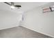 Basement bedroom with ceiling fan, carpet, and window at 1155 Garfield St, Denver, CO 80206