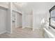 Spacious hallway with light walls and wood-look flooring at 1155 Garfield St, Denver, CO 80206