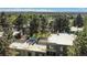 Aerial view of the home's rooftop deck overlooking the golf course and the Denver skyline at 2525 S Dayton Way # 1109, Denver, CO 80231