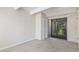 Bright bedroom with glass sliding door, plush carpet and closet at 2525 S Dayton Way # 1109, Denver, CO 80231