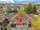 This aerial shot displays the townhome's outdoor deck and a partial view of the well-maintained surrounding community at 12406 E Pacific Cir # D, Aurora, CO 80014