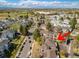 This aerial view showcases the townhome in a well-situated neighborhood, near green spaces and community amenities at 12406 E Pacific Cir # D, Aurora, CO 80014