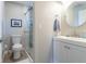 Clean and well-lit bathroom with a glass-enclosed shower and modern fixtures at 12406 E Pacific Cir # D, Aurora, CO 80014
