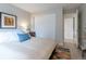 Cozy bedroom with soft lighting, stylish decor, and a spacious closet at 12406 E Pacific Cir # D, Aurora, CO 80014