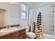 Bathroom features a single sink with shower-tub combo at 4625 Walden Ct, Denver, CO 80249