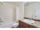 Bathroom features a vanity and shower-tub combo at 4625 Walden Ct, Denver, CO 80249