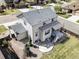 Aerial view of home with deck, patio, and landscaping, situated on a corner lot in a neighborhood at 7811 E 123Rd Ave, Thornton, CO 80602