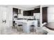 Beautiful kitchen featuring a central island, stainless steel appliances, and ample cabinet space at 7811 E 123Rd Ave, Thornton, CO 80602