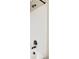 This shower features white tile, sleek bronze fixtures, and a showerhead at 7811 E 123Rd Ave, Thornton, CO 80602
