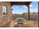 Scenic balcony offering mountain views, perfect for relaxation with a table and chairs for outdoor enjoyment at 1042 Country Club Estates Dr, Castle Rock, CO 80108