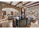 Gourmet kitchen featuring a large center island, stone accents, and open layout at 1042 Country Club Estates Dr, Castle Rock, CO 80108