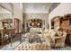 Open-concept living area with stone accent walls, high ceilings, and a seamless flow for entertaining at 1042 Country Club Estates Dr, Castle Rock, CO 80108