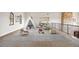 Spacious playroom featuring a variety of toys, natural light, and a fun atmosphere for creative play at 1042 Country Club Estates Dr, Castle Rock, CO 80108