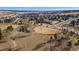 Aerial view of community park, playground, and green space in a residential area at 18130 Bolero Dr, Parker, CO 80134