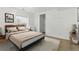 Cozy bedroom featuring a comfortable bed, neutral colors and soft natural light at 18130 Bolero Dr, Parker, CO 80134