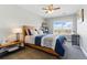 Charming bedroom featuring a ceiling fan, bright natural light, and a stylish color palette at 18130 Bolero Dr, Parker, CO 80134