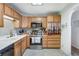 Well-organized kitchen with light wood cabinets, modern appliances, and a bright, clean space at 518 Cherry St, Hudson, CO 80642