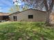 View of the backyard with a grass lawn and a shed in the back corner of the lot at 5618 Carr St, Arvada, CO 80002